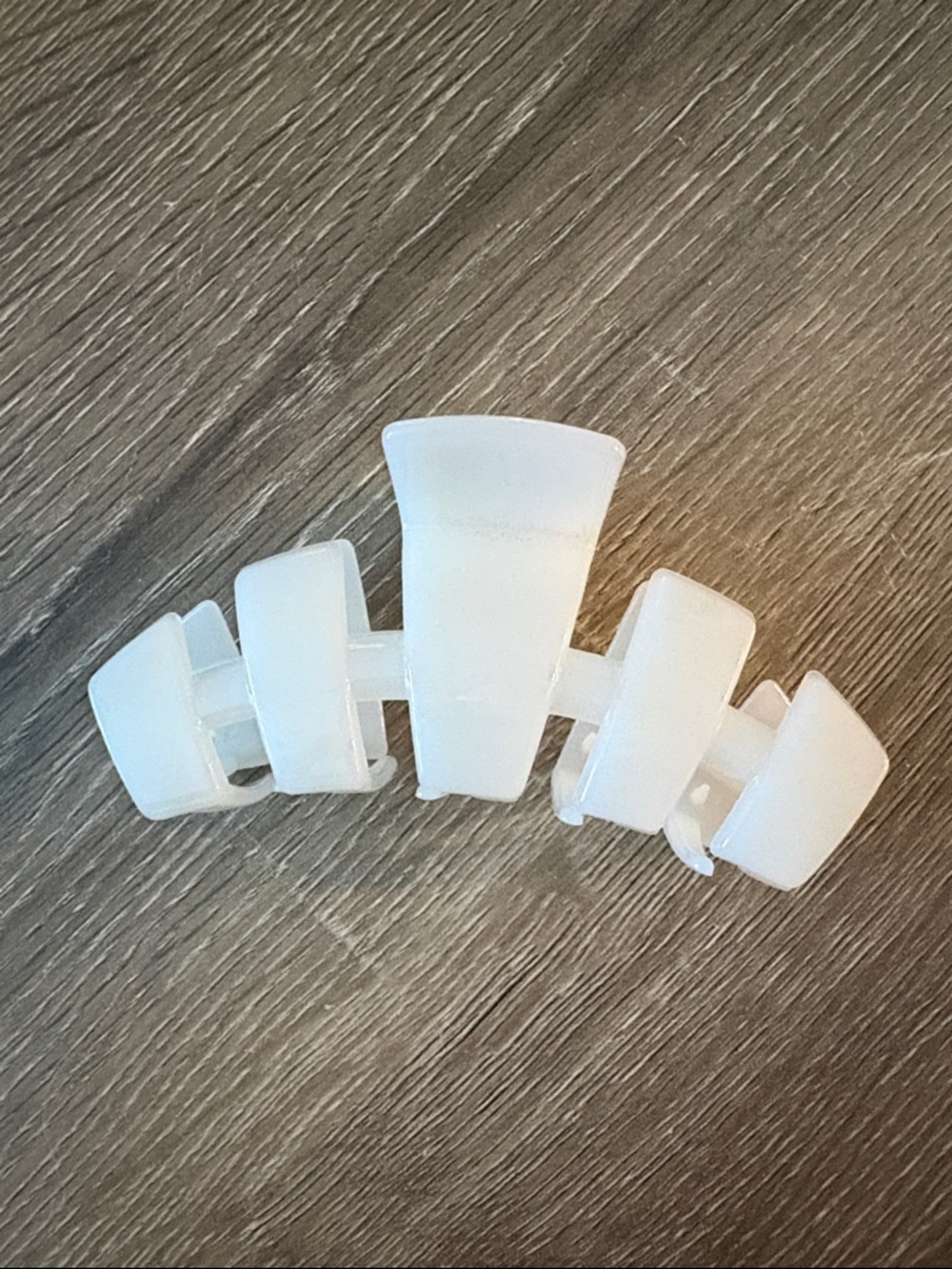 Classic coconut white Teleties hair clip.